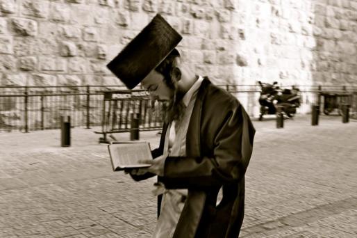 @hisnhertravel of Spain caught this Orthodox Jew in Jerusalem. Like many in the orthodox community, they pointed out, studying and praying IS their daily routine. Many of them do not have traditional jobs: http://hisandhertravel.co/image/23940018210