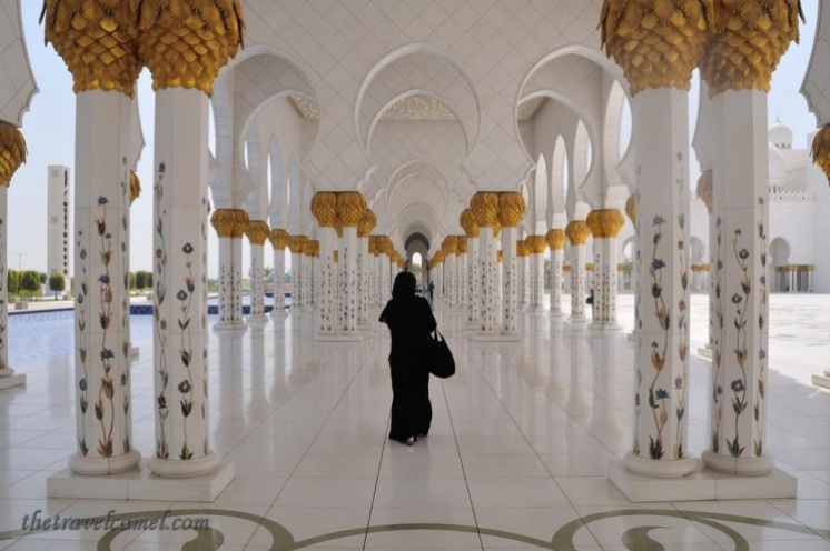 Shane Dallas (@TheTravelCamel) of the UAE caught the perfect contrast of a stranger walking in an Abu Dhabi mosque: https://twitter.com/TheTravelCamel/status/524282669928964096/photo/1