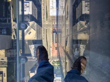 Joseph (@Allophile) of the USA took this downward-facing shot in, of course, the Willis Tower of Chicago: https://twitter.com/Allophile/status/531902342258786304/photo/1